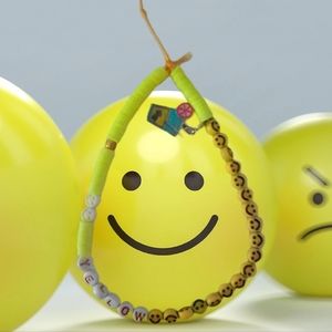 Yellow, Yellow, and yellow phone charm handmade by mxshabeads